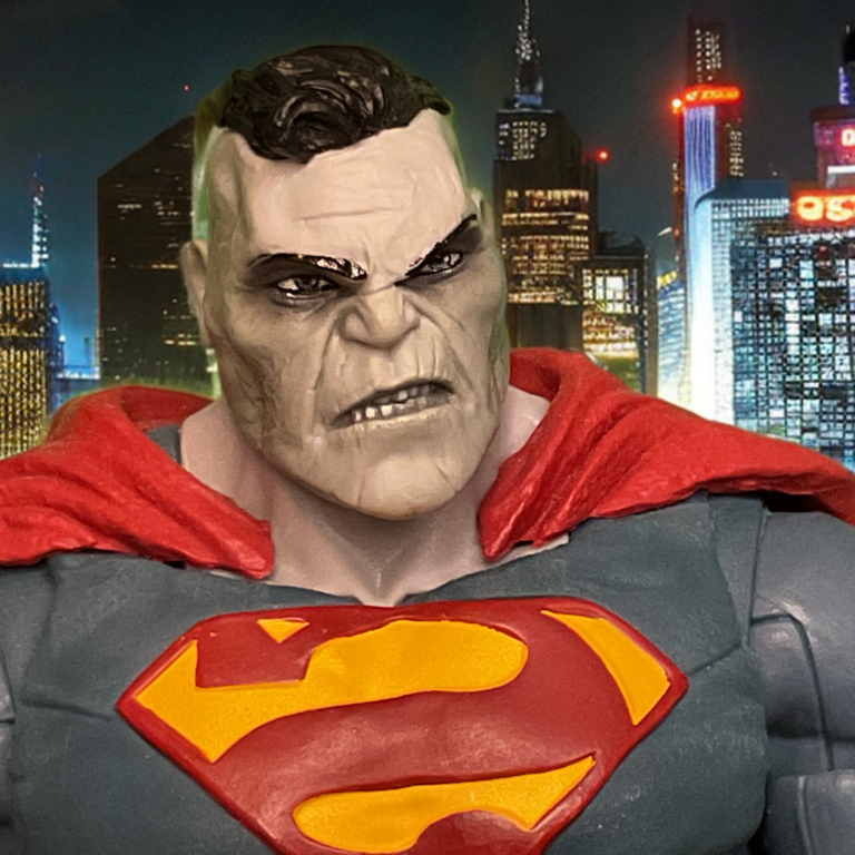 Extreme close-up of Bizarro Rebirth action figure’s cracked chalk-white skin texture on face and neck.