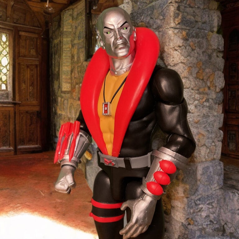 Action figure of Destro in front of the gothic stone architecture of Castle Destro, blending medieval Scottish fortification with modern defenses.