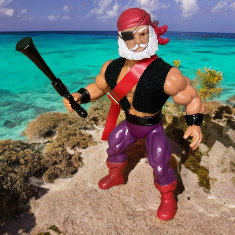 Full-length shot of a 5.5-inch pirate action figure sporting a molded red bandana, a blue vest sculpt, and black boots.