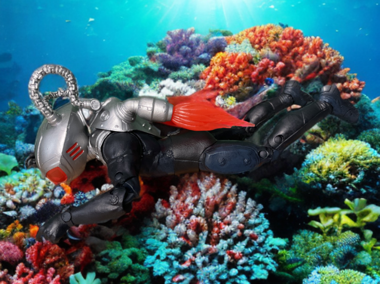 Black Manta action figure posed as if attacking Atlantis, DC Multiverse Aquaman villain.