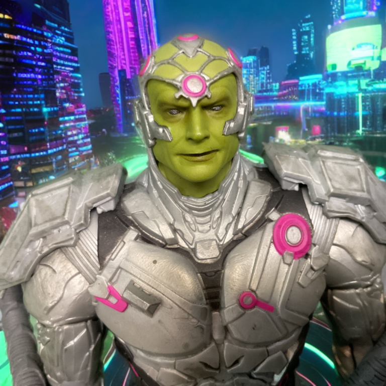 Close-up head sculpt of McFarlane DC Multiverse Brainiac action figure showing green skin and superior intellect.