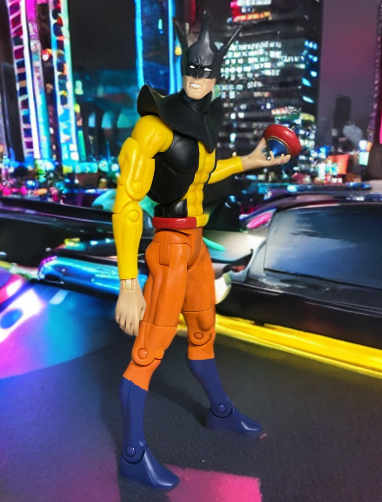 Toyman action figure wielding explosive spinning top accessory.