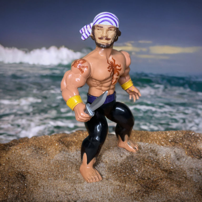 Front view of a 5.5-inch muscular plastic action figure with a bare torso, tan skin tone, and dark blue pirate pants, standing in a neutral position.