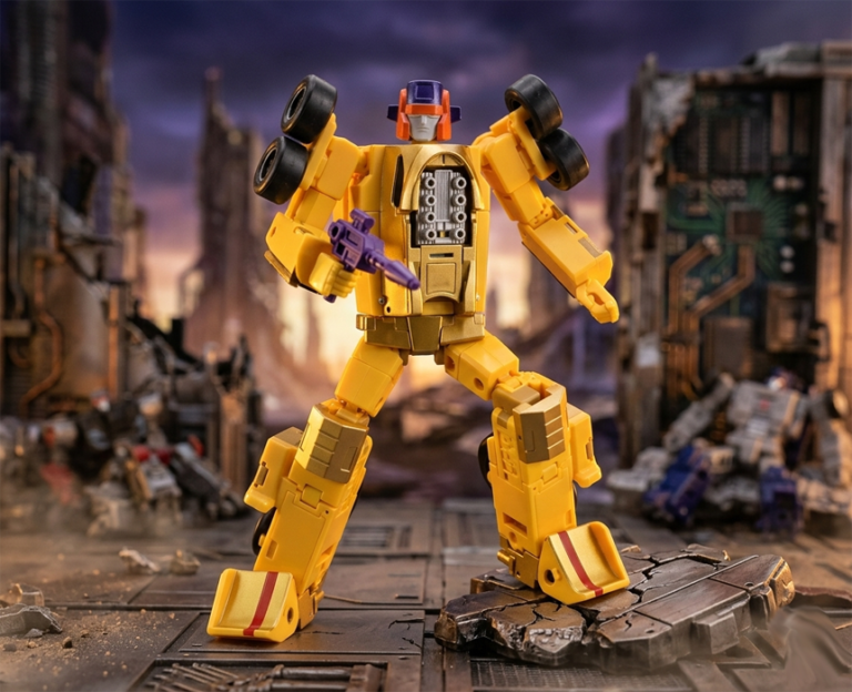 Full robot view of DX9 Guiliano standing in his bright yellow armor while aiming a large black rifle across his body.